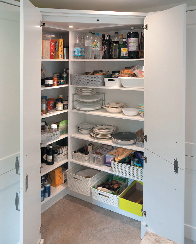 fitted kitchen in Teesside showing an open corner larder with storage